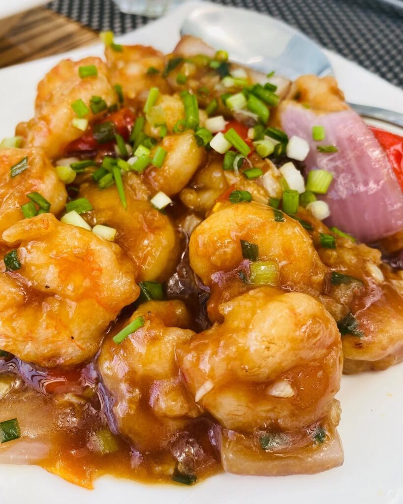 Chili garlic prawns garnished with spring onions and served in one of the best Chinese restaurants in Nairobi.